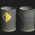 Public Facility Two Metal Trash Cans With Yellow Warning Sign