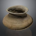 Ancient Hand Carved Clay Pot With Intricate Surface Patterns And Textures
