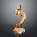 Golden Sculpture With Horse Head Trident And Curved Body On Circular Base