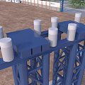 Large Blue Industrial Equipment Structure With White Cylindrical Components In Urban Area