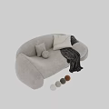 Modern Light Colored Two Seater Sofa With Soft Pillows Knitted Blanket And Decorative Balls
