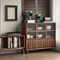 Modern Walnut Wood Sideboard With Glass Door Cabinets Decorative Figurines And Adjacent Bookshelf