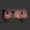 Old Red Rusty Train Carriage With Worn Body And Metal Wheels On Display Track
