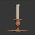White Candle Placed On Copper Candlestick Holder With Base And Handle