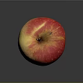 Fresh Ripe Red and Yellow Apple with Smooth Skin on Dark Background
