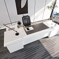 Modern Office Interior Featuring Large White Desk Leather Chair Floor Lamp And Green Plant