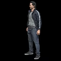 Man Standing in Black Jacket Gray T-Shirt Dark Pants and Gray Shoes on Black Background