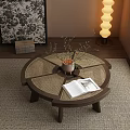 Modern Wooden Rattan Coffee Table With Open Book And Small Plant In Ceramic Pot