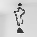 Modern Black Chandelier With Wave Design Hanging From Ceiling In Room