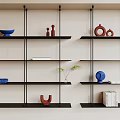 Black Wall Shelves With Decorative Vases Books And Small Plant In Modern Room