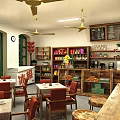 Vintage Nostalgic Local Cafe Shop With Cozy Dining Seats And Well Arranged Product Display Shelves