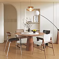 Elegant Restaurant Dining Area With Round Wooden Table Mixed Chairs And Decorative Lighting Shelf