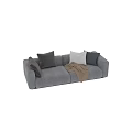 Cozy Gray Three Seater Sofa With Plush Cushions And Brown Throw Blanket
