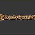 Elegant Golden Bracelet With Intertwined Chain Design And Decorative Gemstone