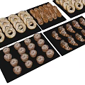 Baked Goods Assortment with Donuts Croissants and Rolls on Black Trays