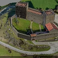 Medieval Castle Architecture With Stone Walls Towers On Green Hill And Path
