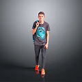 Man Wearing Gray T-shirt Blue Graphic Dark Pants Orange Shoes With Backpack Against Gray Background