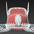 Traditional Red Hat With Blue Wing Shaped Decorations White Accents And Intricate Patterns