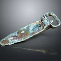 Ancient Bronze Sculpture Carving With Rusted Surface Loop Handle And Detailed Design