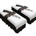Comfortable Single Beds With White Sheets Black Runners And Decorative Ornaments In Spa Setting