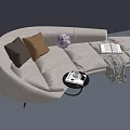 Modern White Curved Chaise Lounge with Throw Pillows Small Table and Books