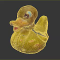 Yellow Rubber Duck Doll With Purple Blue Eyes And Decorative Patterns