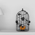 Black Metal Birdcage Ornament Set With Floral Decor Orange Candle And Table Lamp