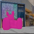 Large Pink Rabbit Sculpture In Front Of Modern Commercial Building With Alphabet Art