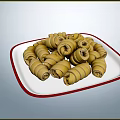 Plateful of Fresh Stuffed Vegetable Rolls on White Plate with Red Rim