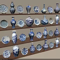 Traditional Blue and White Ceramic Vessels with Vases and Plates Displayed on Wooden Shelves