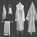 Cozy Bathrobes and Towels Hanging on Gray Background with Towel Ring Bar and Striped Details