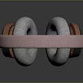 Modern Headphones With Gray Ear Cushions Pink Black Headband And Orange Accents