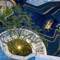 Modern Garden Landscape Design With Curved Canopy Water Feature And Stone Paving