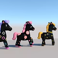 Three Black Toy Ponies with Various Decorations Purple Pink Yellow Manes and Colorful Patterns