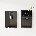Modern Household Appliances with Black Design Digital Display Control Buttons and Green Plant Accent