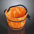 Wooden Bucket With Black Rope Handle And Natural Wood Grain Details