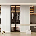 Modern Wardrobe With Glass Doors Hanging Space And Adjacent Desk Area