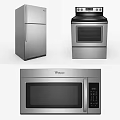 Modern Stainless Steel Kitchen Appliances Including Refrigerator Microwave And Stove