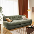 Plush Green Two-seater Sofa With Cushions Pillows Potted Plant And Floor Lamp In Living Room