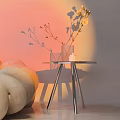 Modern Side Table with Metal Frame Glass Top and Vase of Flowers by Sofa