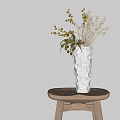Gray Textured Ceramic Vase With Green And Brown Natural Flowers On Light Wooden Round Table