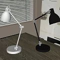 White And Black Modern Desk Lamps On Dark Table Near Window Blinds