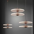Three Modern Layered Circular Chandeliers With Glass Shades And Metal Frames