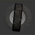 Stacked Tires With Diamond Pattern Tread And White Metal Rims 3d model