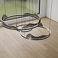 Modern Round Wave Edged Chandelier Hanging In Room With Wooden Floor And Window