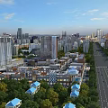 Aerial Planning Of Urban City With High Rise Buildings Streets And Greenery