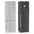 Modern Kitchen Appliances Including Refrigerator Range Hood And Gas Stove