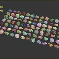 Natural Stone Pebbles In Various Colors And Shapes Arranged On Black Background