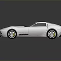 Sleek Silver Two Door Sports Car With Streamlined Body And Alloy Wheels