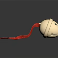 Golden Bell Ornament with Red Ribbon on Dark Background and Shiny Reflection